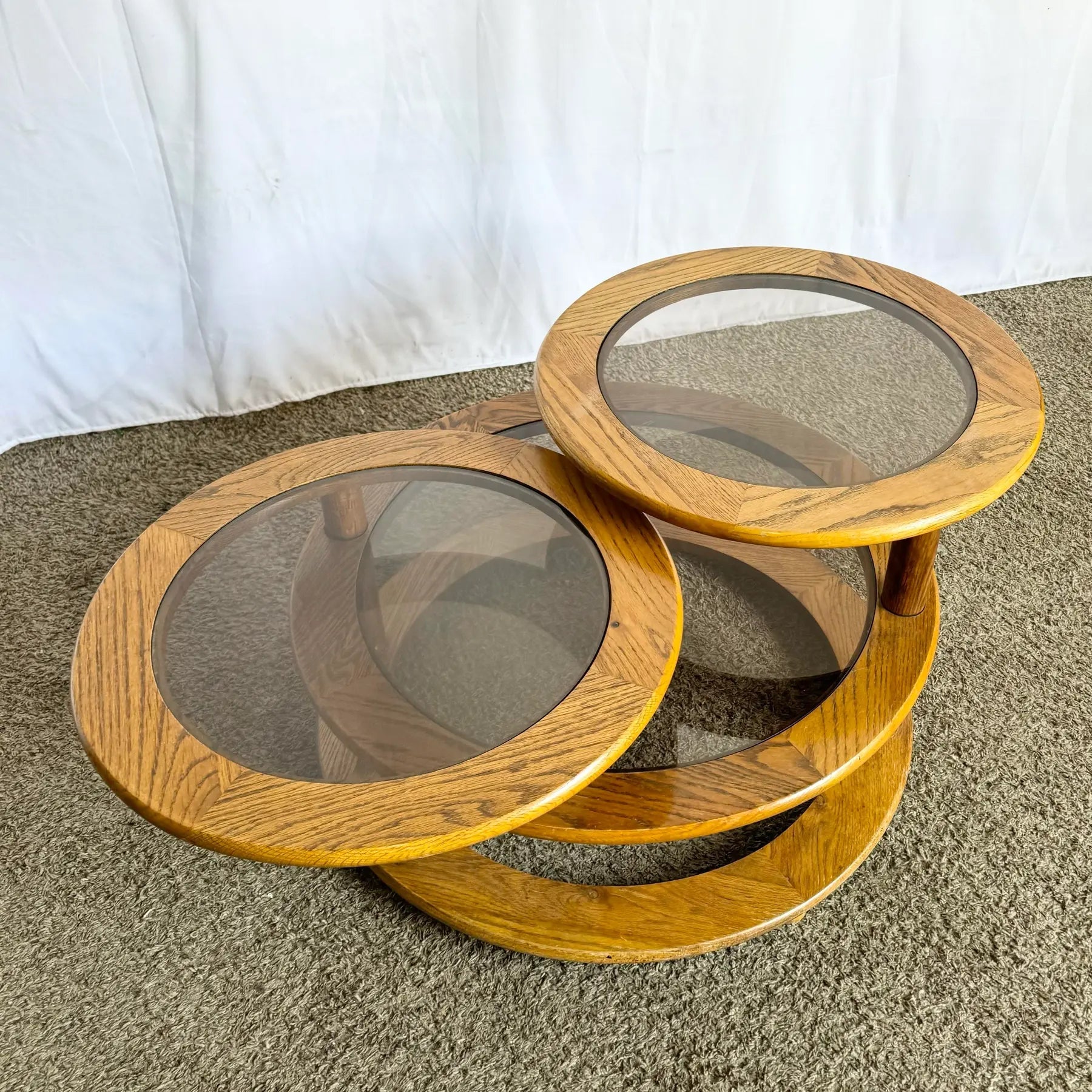 Mid Century Modern Three Tier Oak and Smoked Glass Swivel Coffee Table - Dolphin & Flamingo