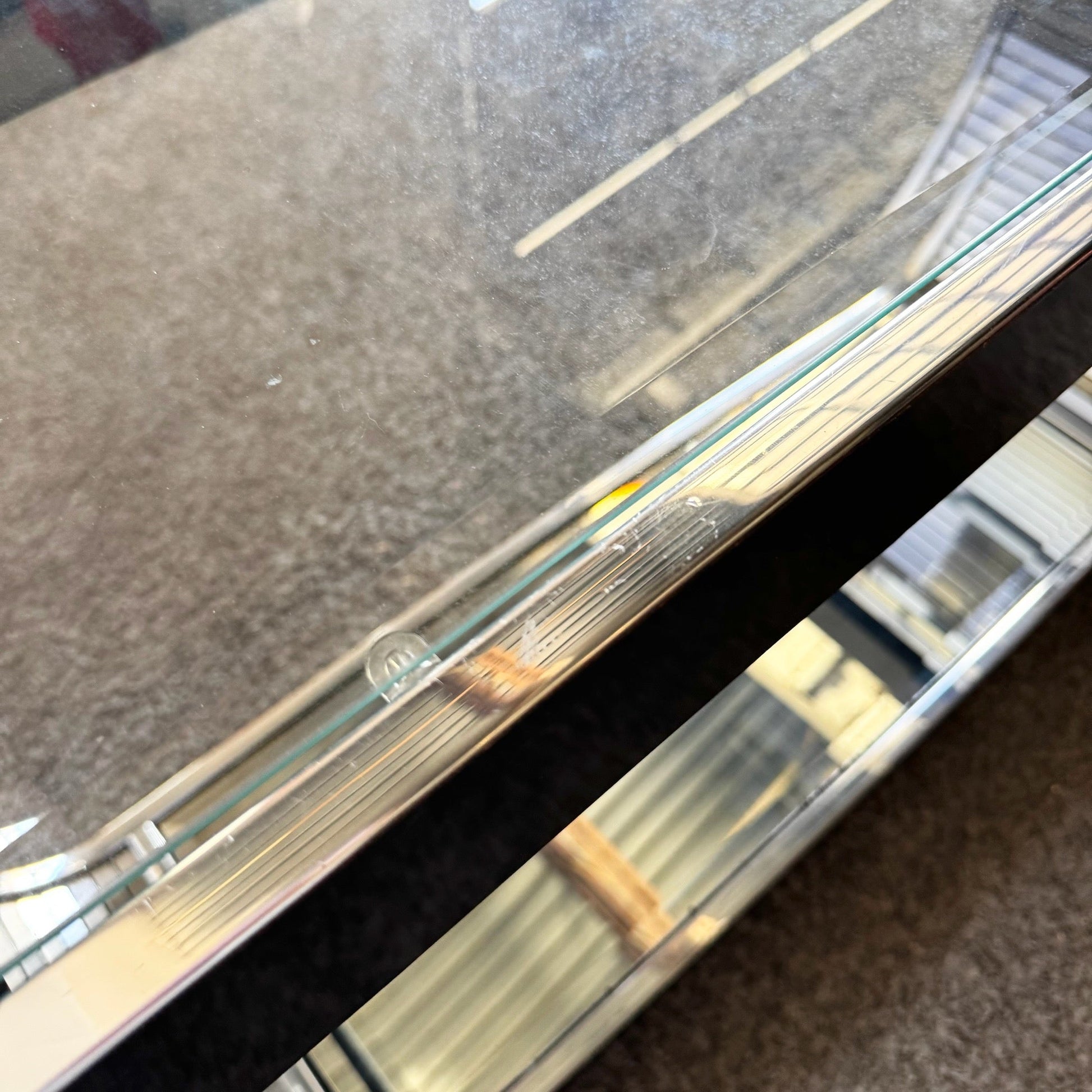 Postmodern Chrome Mirror and Black Laminate Waterfall Console Table - Dolphin & Flamingo