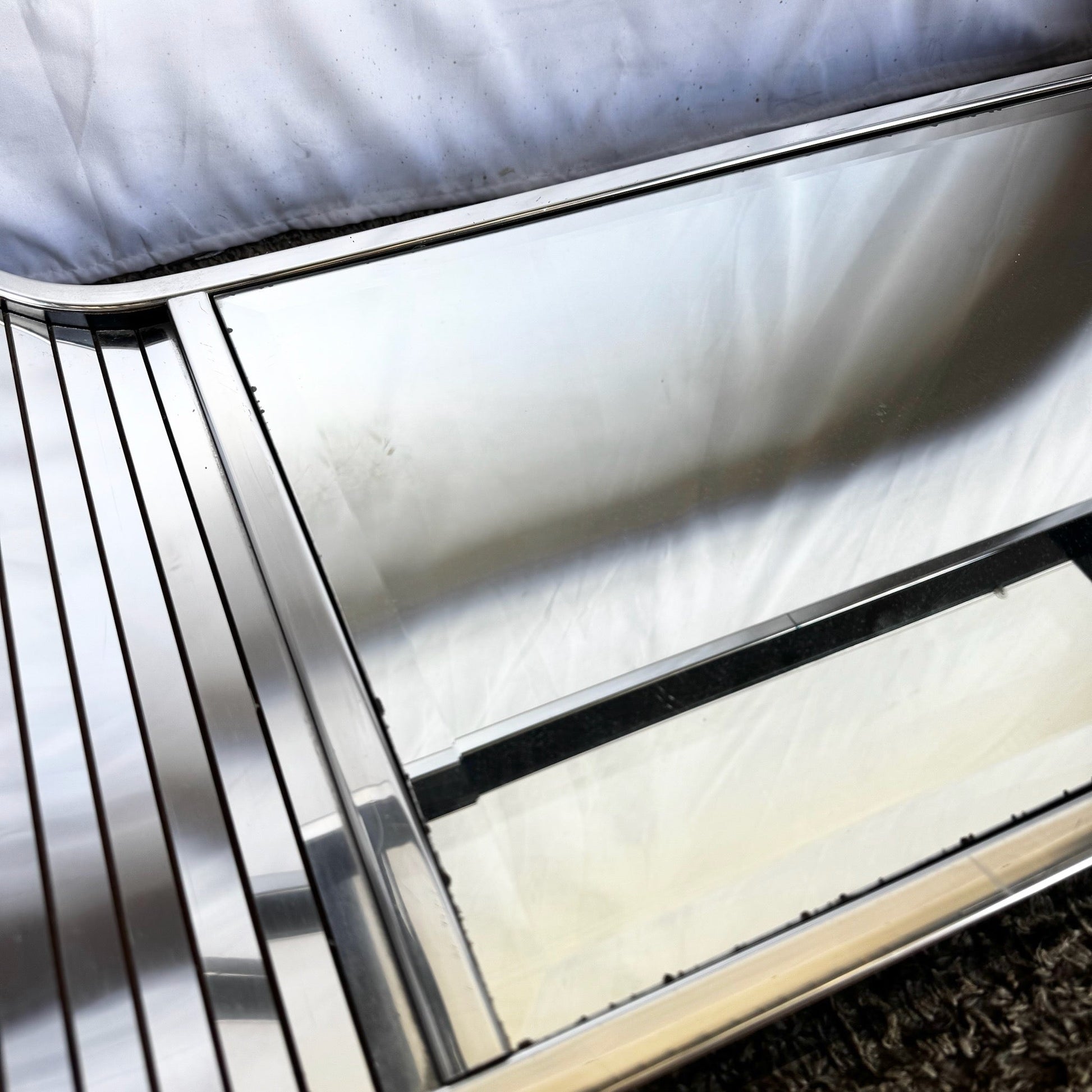 Postmodern Chrome Mirror and Black Laminate Waterfall Console Table - Dolphin & Flamingo