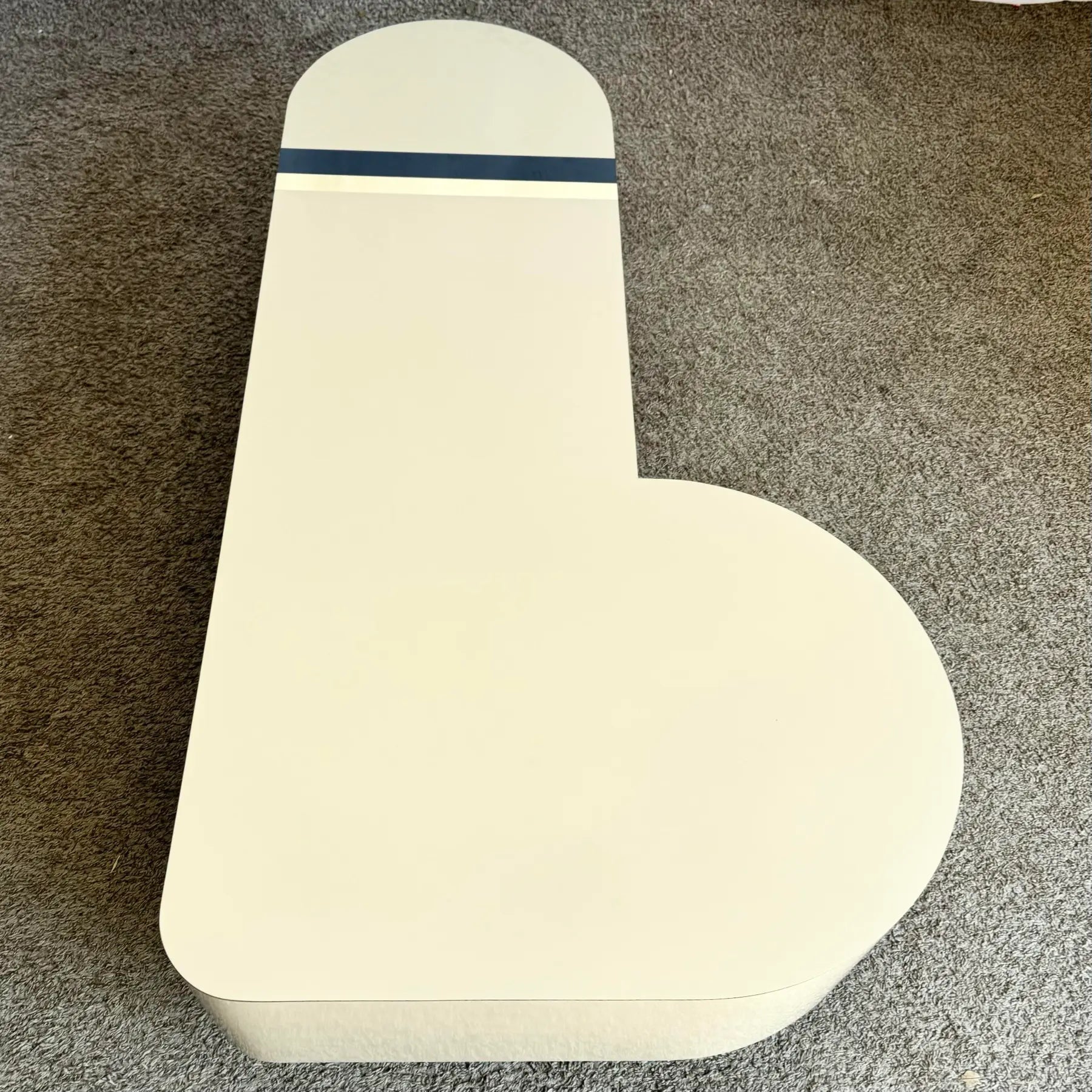 Postmodern Cream Laminate Love Stick Coffee Table With Navy Blue and Gold Crown Accent on Casters - Dolphin & Flamingo