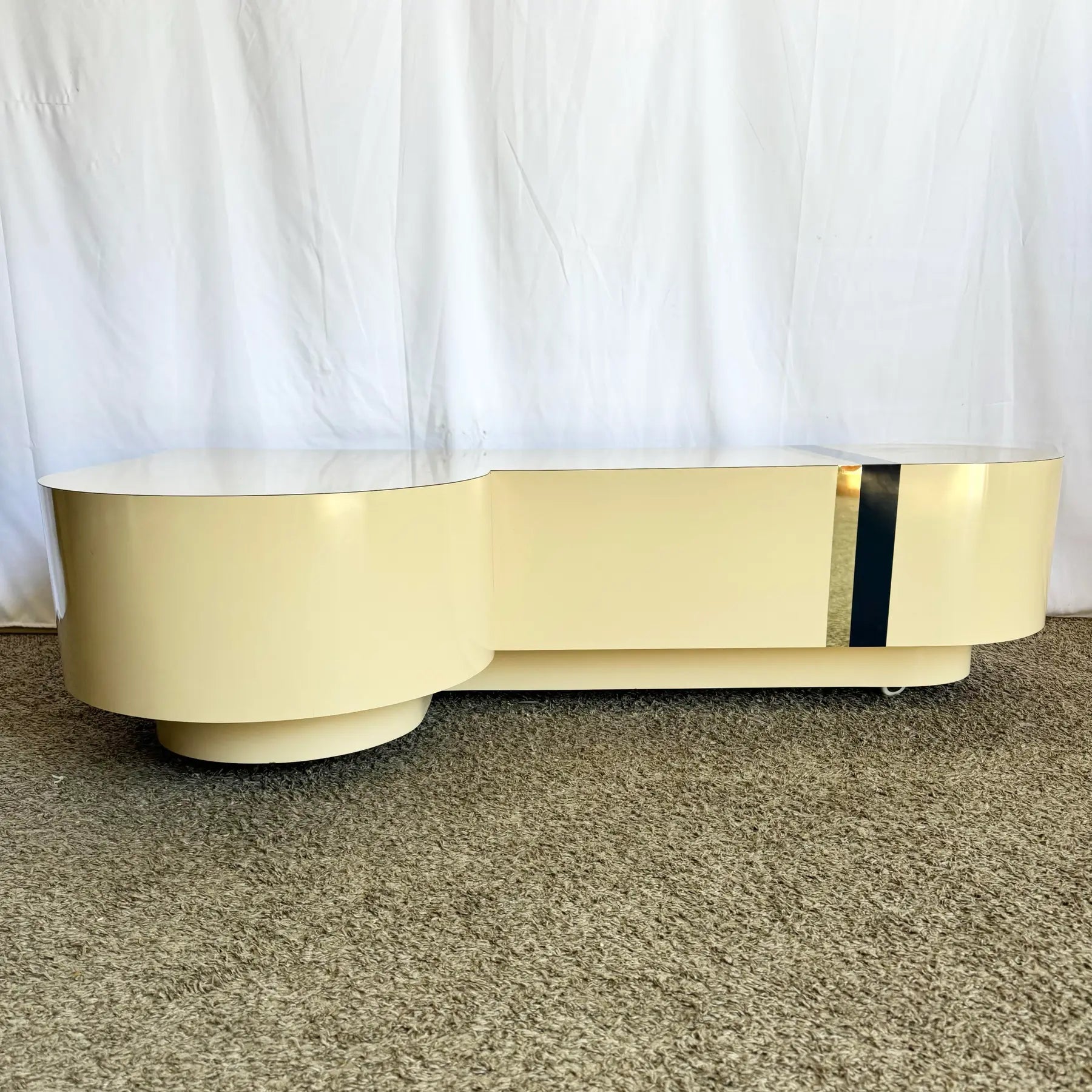 Postmodern Cream Laminate Love Stick Coffee Table With Navy Blue and Gold Crown Accent on Casters - Dolphin & Flamingo