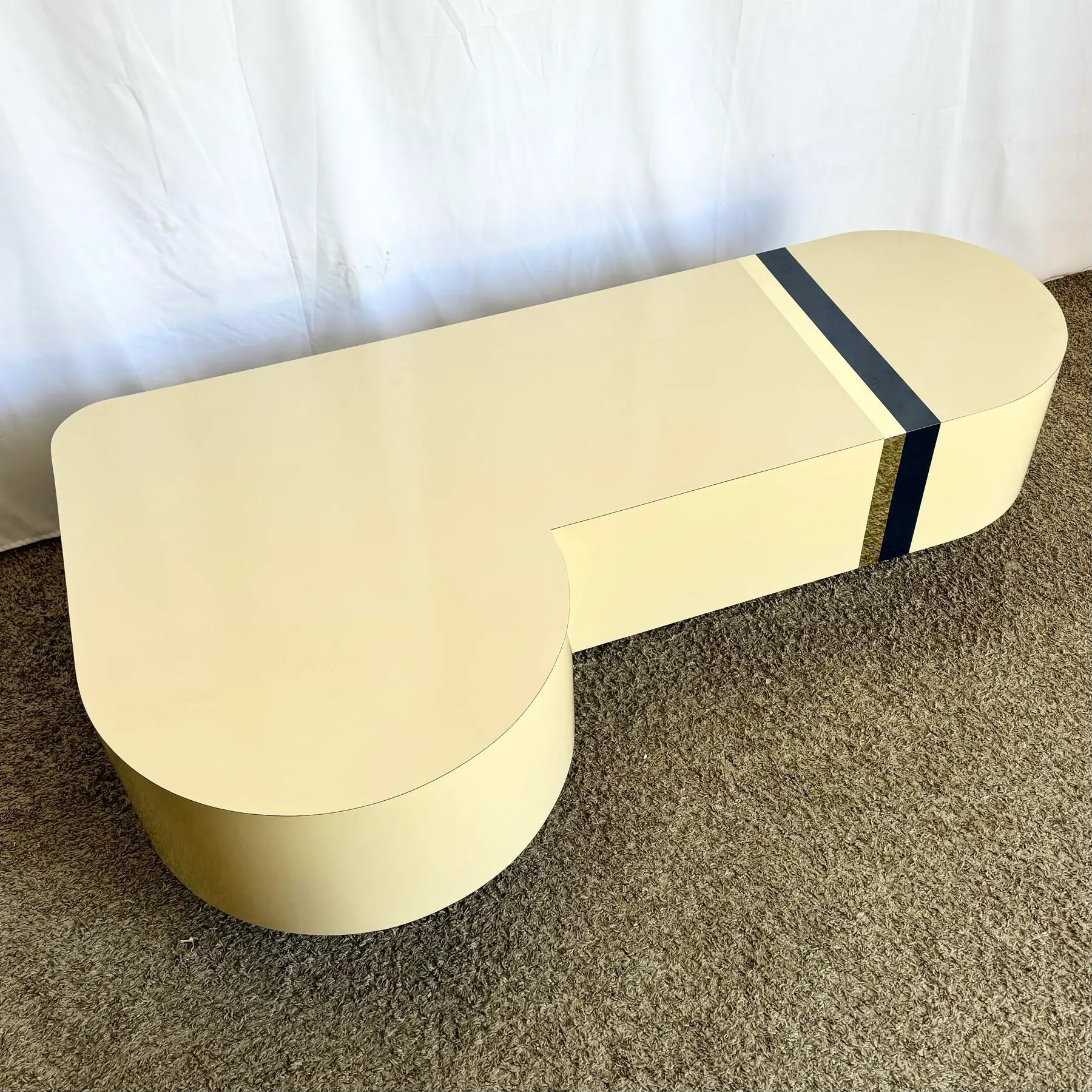Postmodern Cream Laminate Love Stick Coffee Table With Navy Blue and Gold Crown Accent on Casters - Dolphin & Flamingo