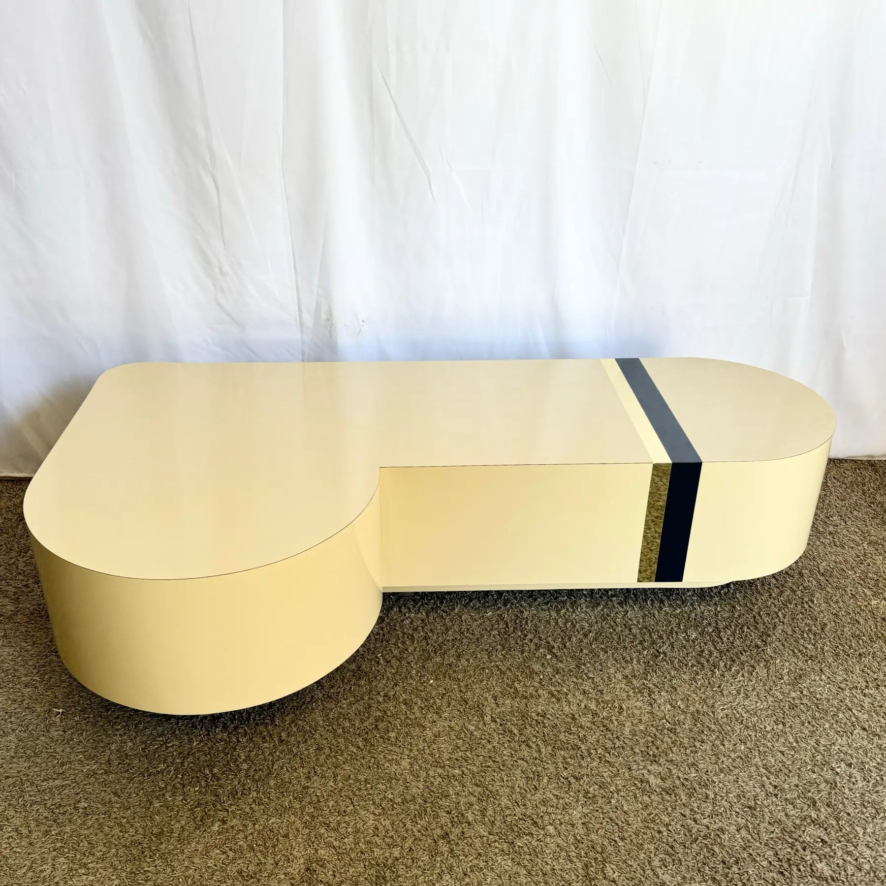 Postmodern Cream Laminate Love Stick Coffee Table With Navy Blue and Gold Crown Accent on Casters - Dolphin & Flamingo