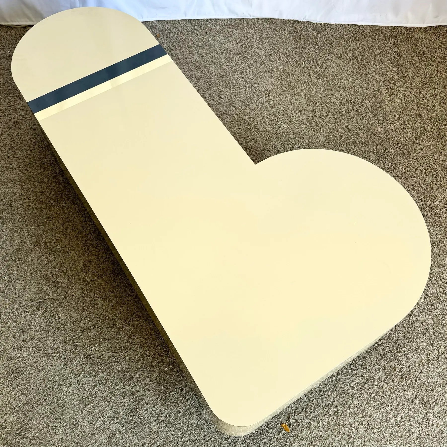 Postmodern Cream Laminate Love Stick Coffee Table With Navy Blue and Gold Crown Accent on Casters - Dolphin & Flamingo