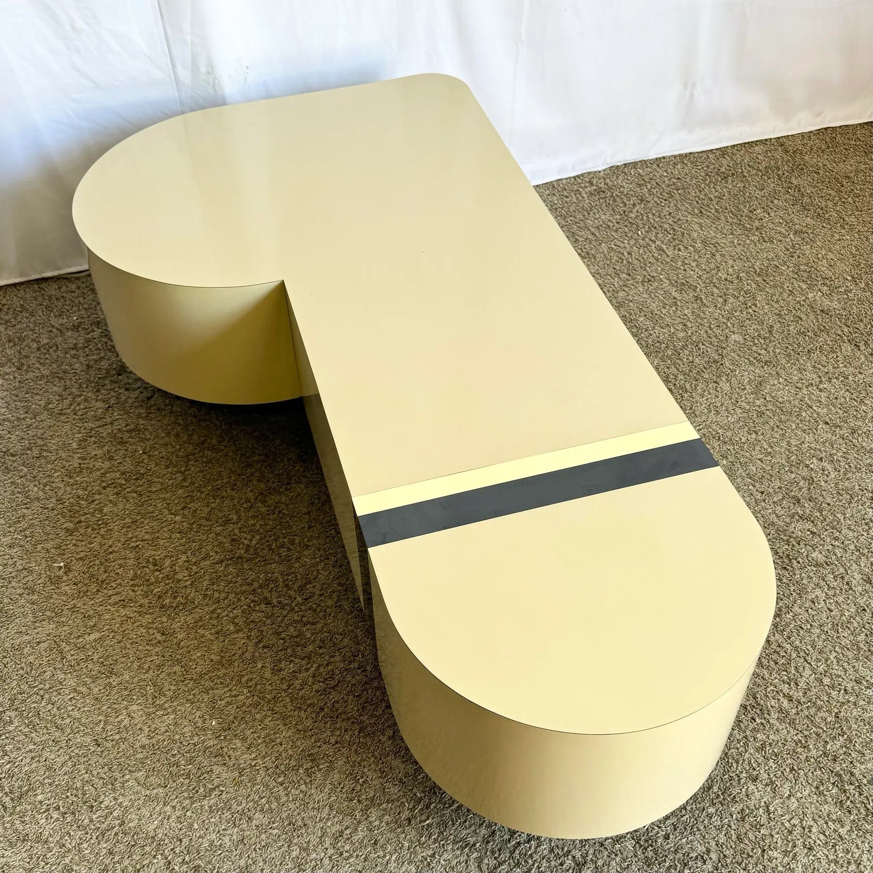 Postmodern Cream Laminate Love Stick Coffee Table With Navy Blue and Gold Crown Accent on Casters - Dolphin & Flamingo