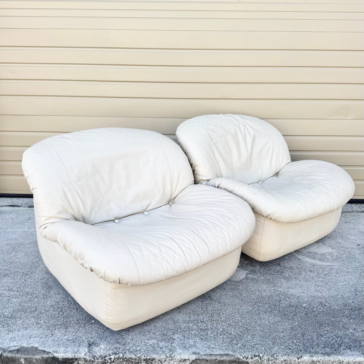 Postmodern Cream Sculpted Tufted Leather Swivel Lounge Chairs - A Pair - Dolphin & Flamingo
