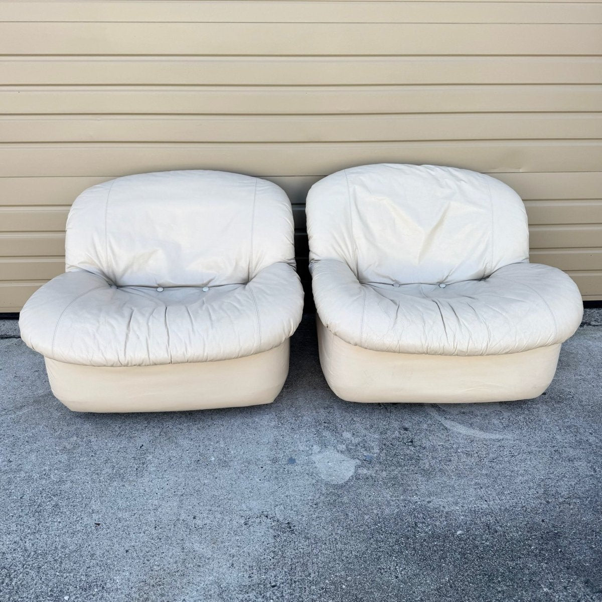 Postmodern Cream Sculpted Tufted Leather Swivel Lounge Chairs - A Pair - Dolphin & Flamingo