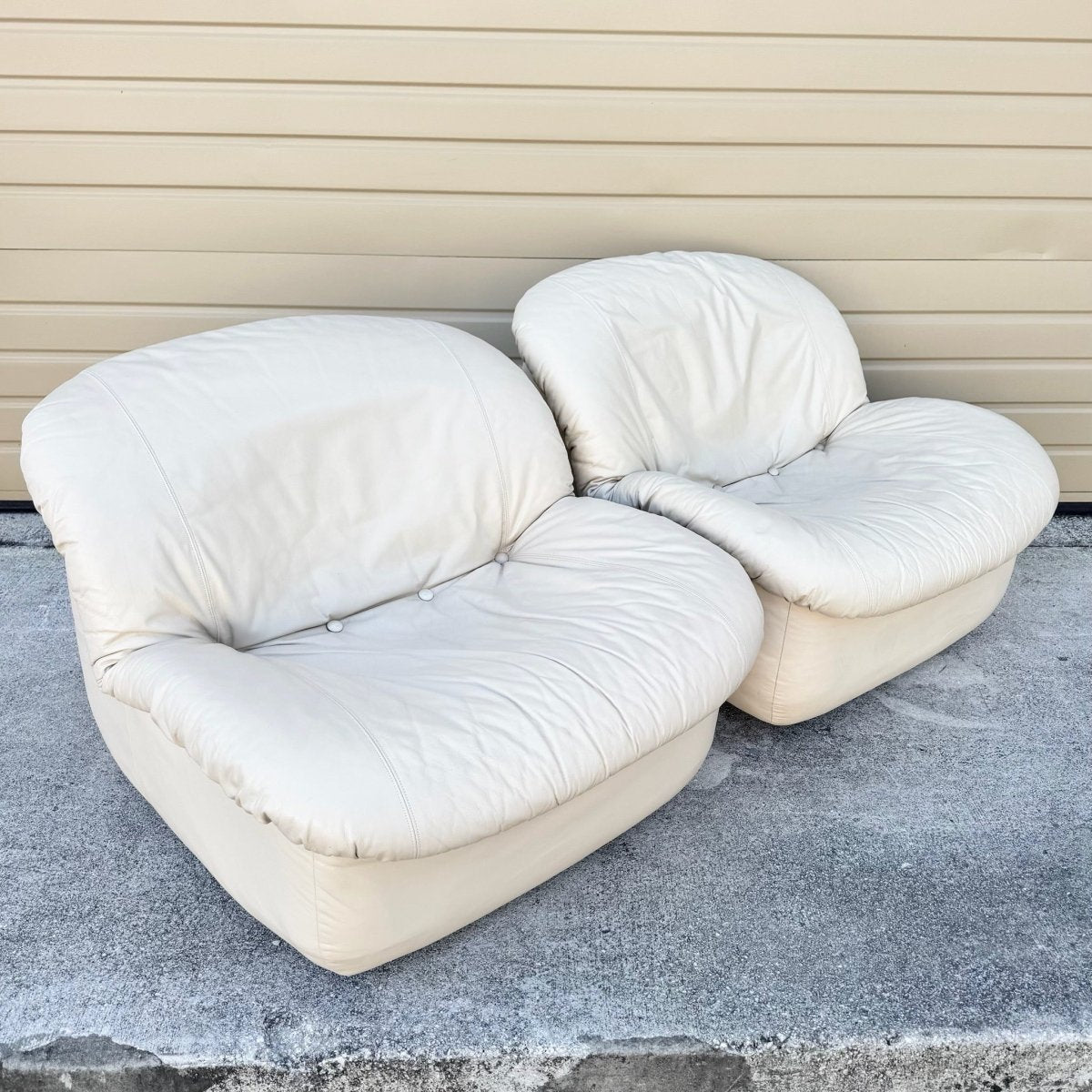 Postmodern Cream Sculpted Tufted Leather Swivel Lounge Chairs - A Pair - Dolphin & Flamingo