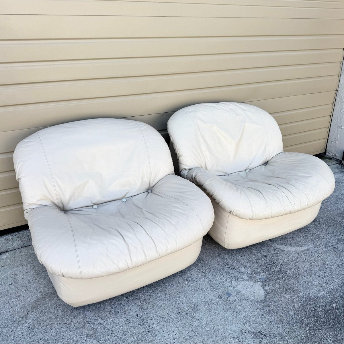 Postmodern Cream Sculpted Tufted Leather Swivel Lounge Chairs - A Pair - Dolphin & Flamingo