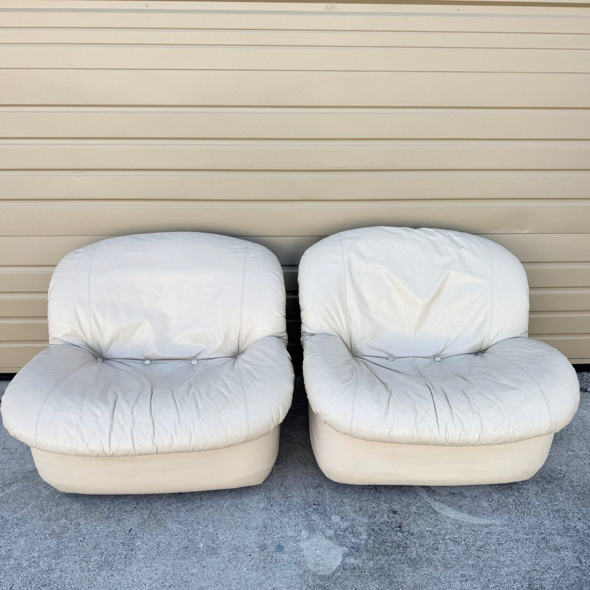 Postmodern Cream Sculpted Tufted Leather Swivel Lounge Chairs - A Pair - Dolphin & Flamingo