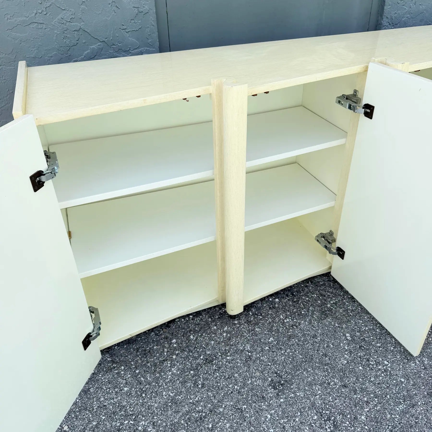 Postmodern Cream Woodgrain Finished Sawtooth Wave Credenza Dolphin & Flamingo