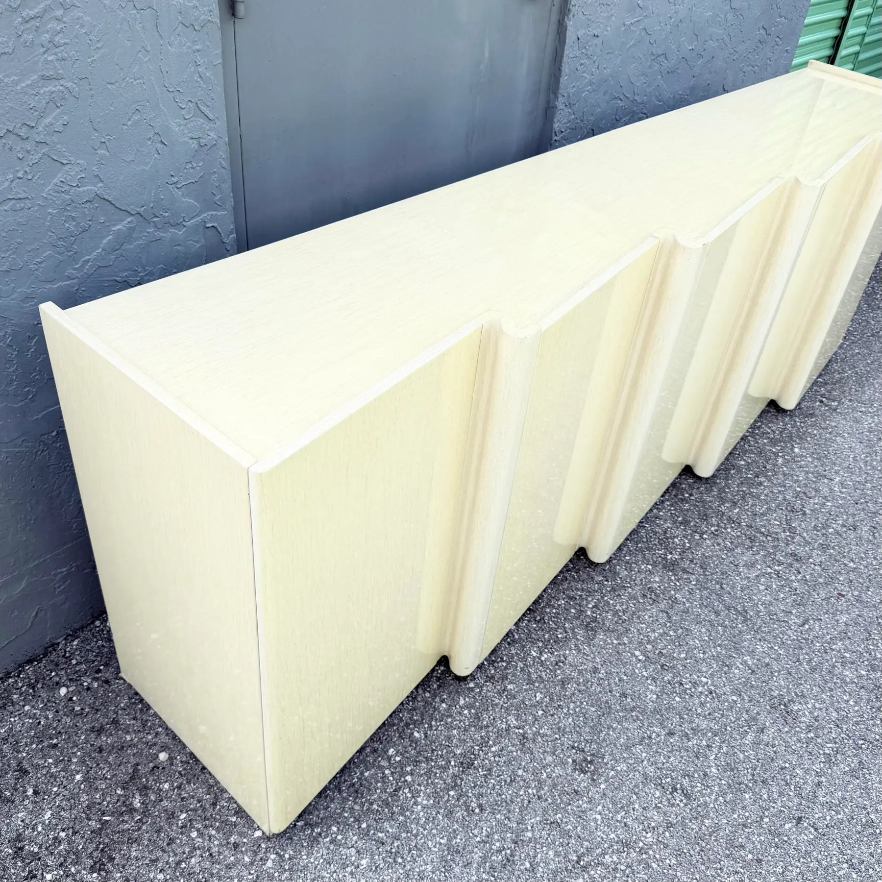 Postmodern Cream Woodgrain Finished Sawtooth Wave Credenza Dolphin & Flamingo