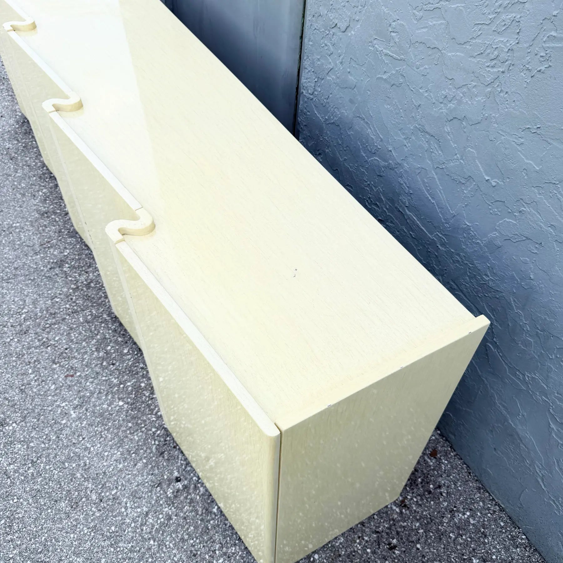 Postmodern Cream Woodgrain Finished Sawtooth Wave Credenza Dolphin & Flamingo