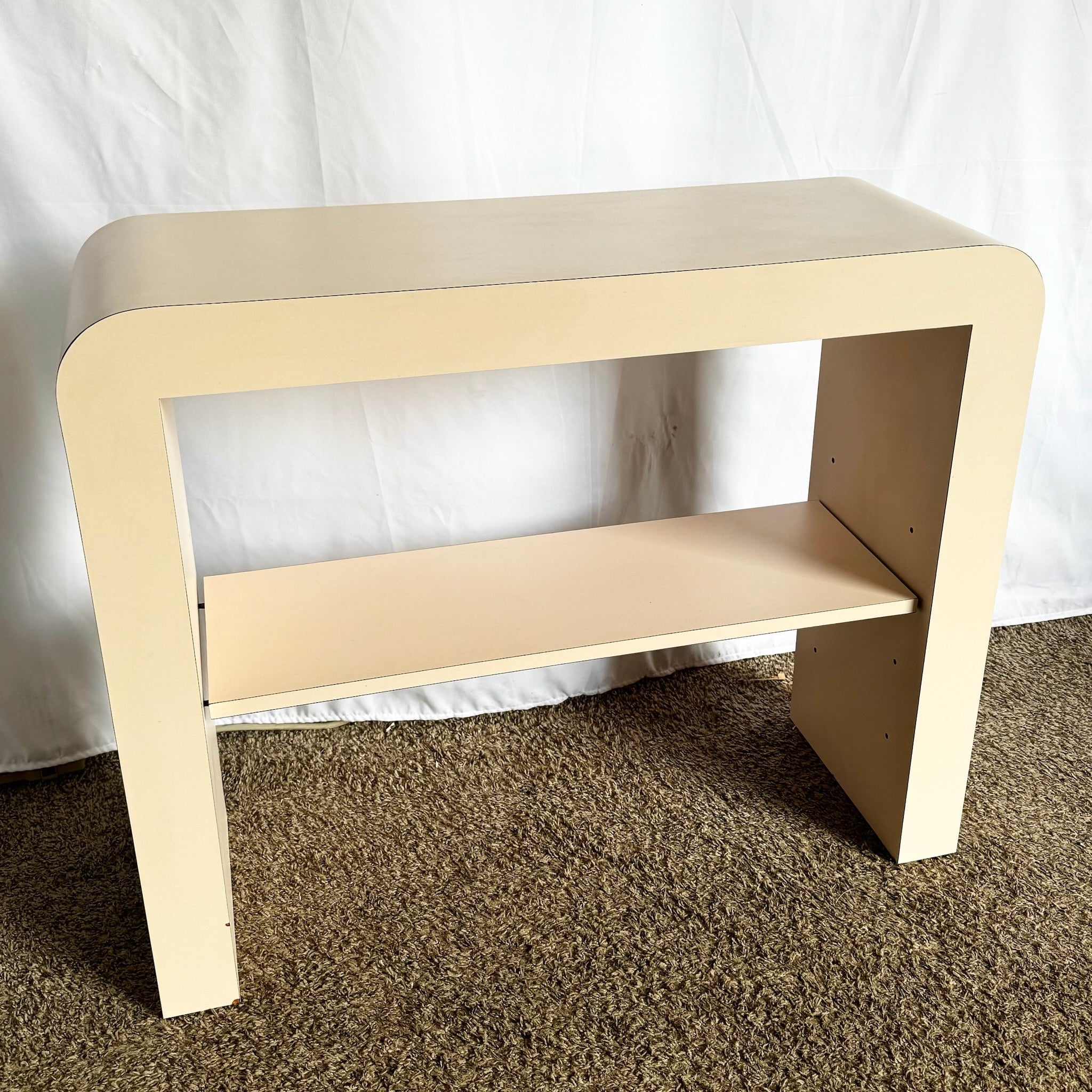 Postmodern Light Pink Laminate Waterfall Console With Adjustable Shelf - Dolphin & Flamingo