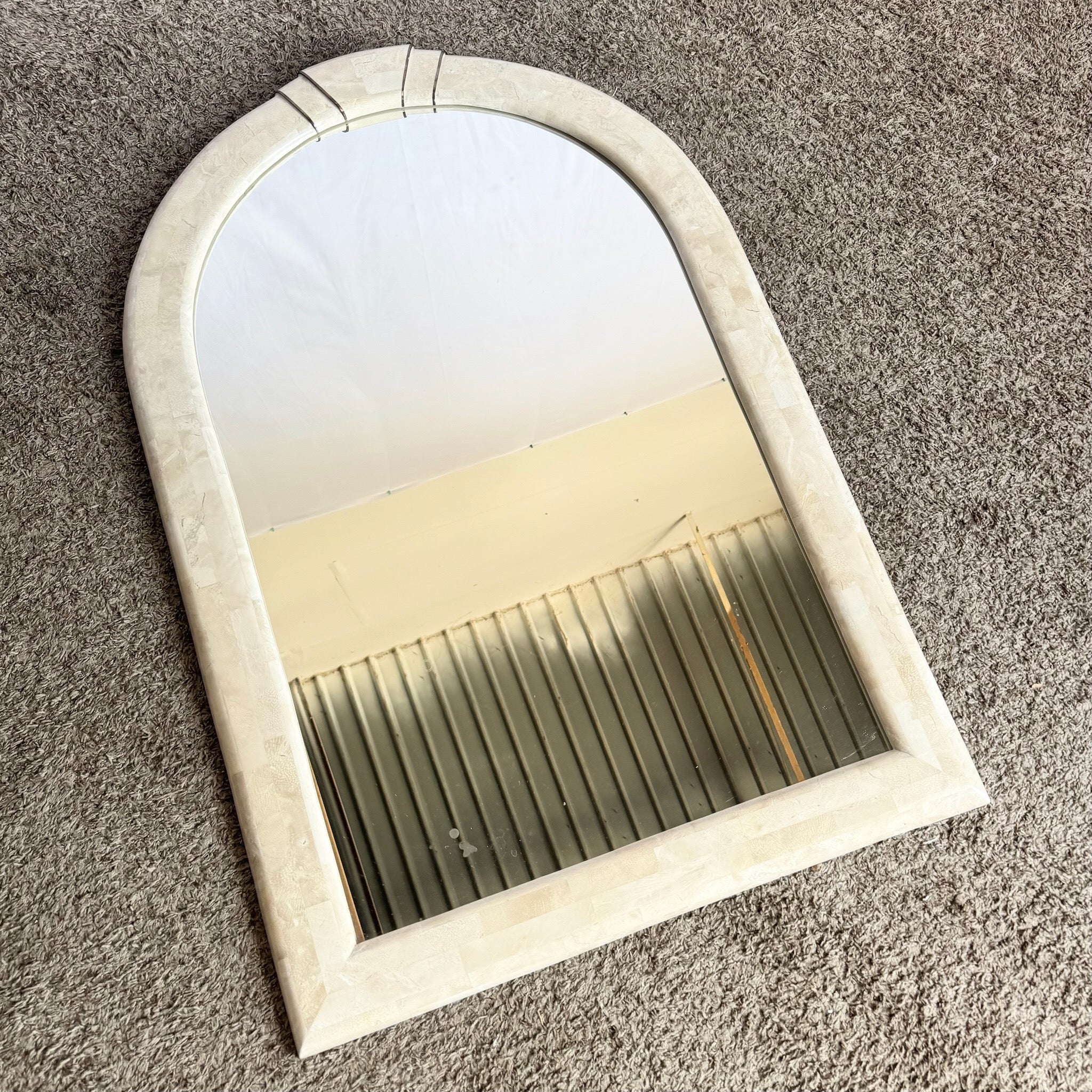 Postmodern Polished Tessellated Stone Wall Mirror With Brass Inlay by Alexvale Furniture - Dolphin & Flamingo