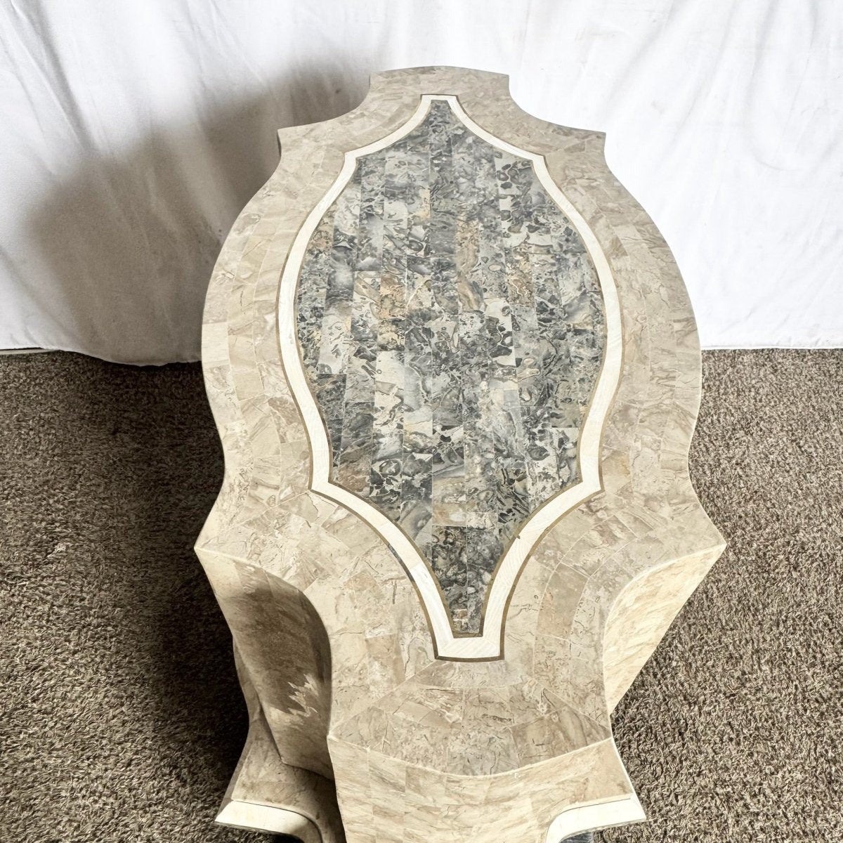 Postmodern Sculpted Grey White and Tan Tessellated Stone Dining Table Base With Brass Inlay - Dolphin & Flamingo