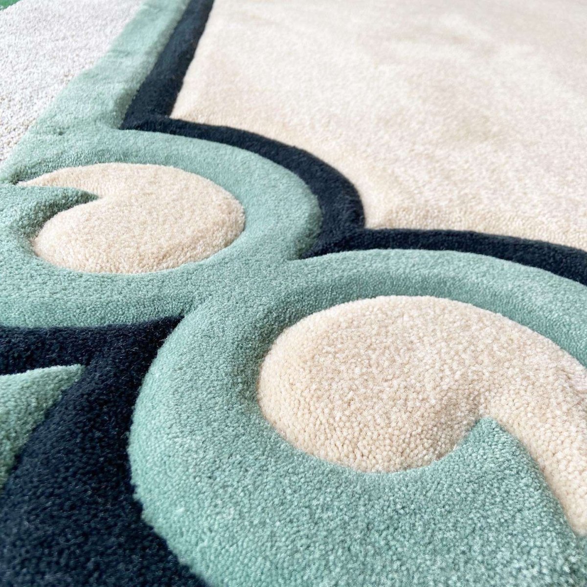 Postmodern Tan, Black and Green Rectangular Area Rug - Dolphin & Flamingo
