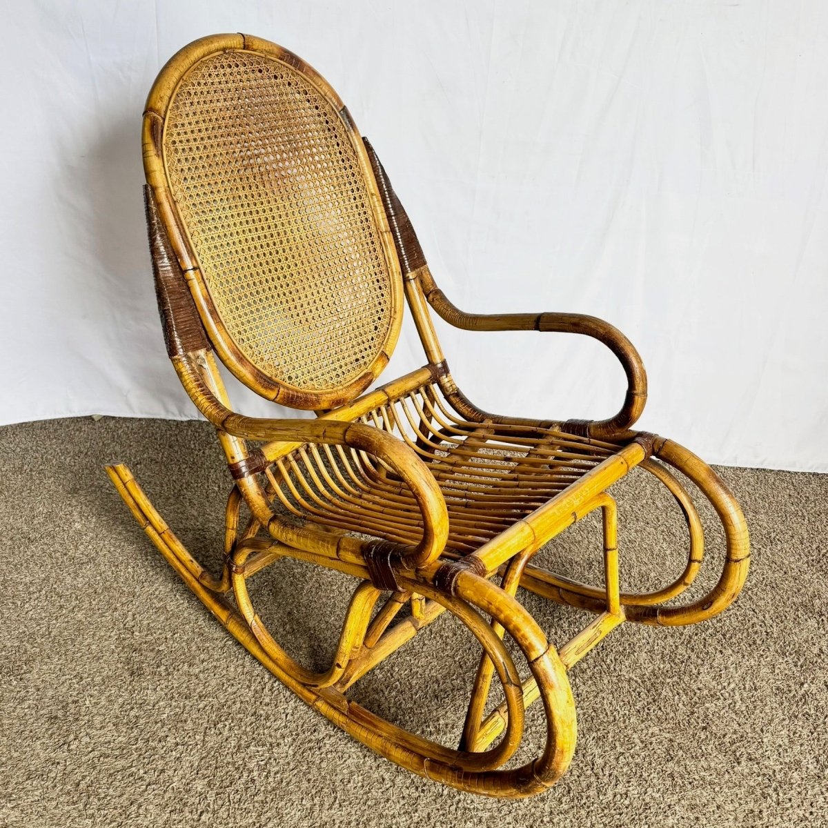 Vintage Boho Chic Bamboo and Cane Rocking Chair - Dolphin & Flamingo