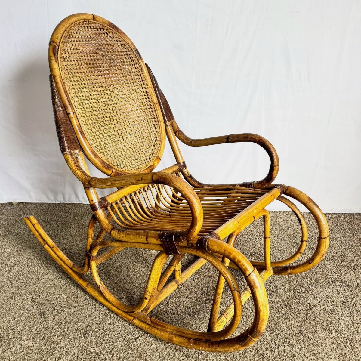 Vintage Boho Chic Bamboo and Cane Rocking Chair - Dolphin & Flamingo