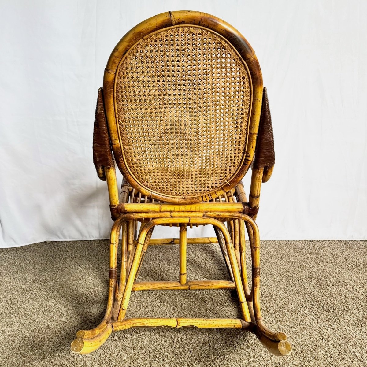 Vintage Boho Chic Bamboo and Cane Rocking Chair - Dolphin & Flamingo