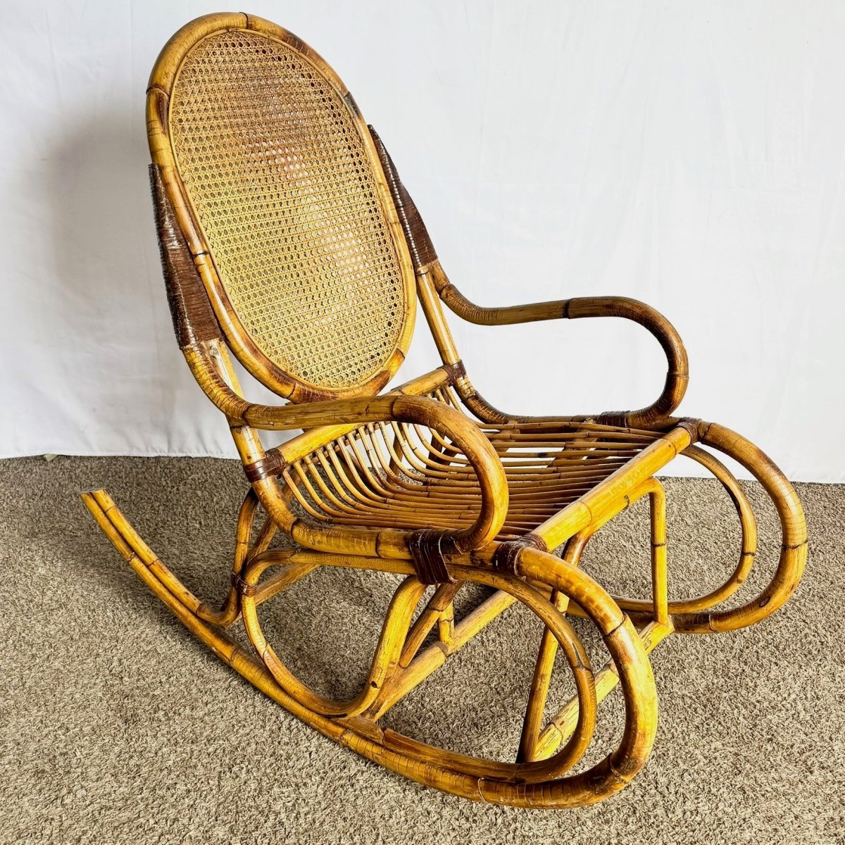 Vintage Boho Chic Bamboo and Cane Rocking Chair - Dolphin & Flamingo