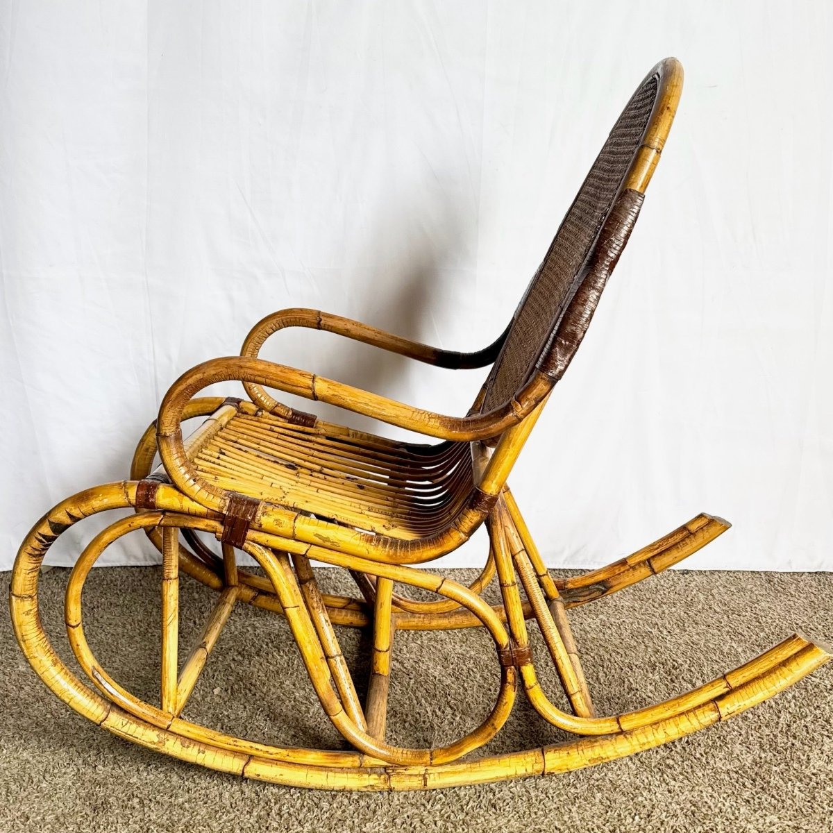 Vintage Boho Chic Bamboo and Cane Rocking Chair - Dolphin & Flamingo