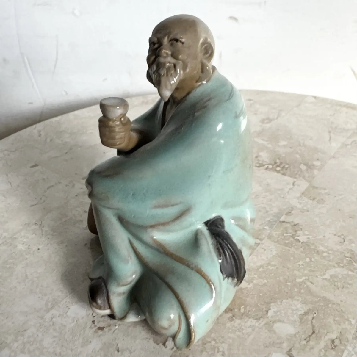 Vintage Chinese Pottery Figurine/Sculpture of a Mudman Drinking Tea - Dolphin & Flamingo