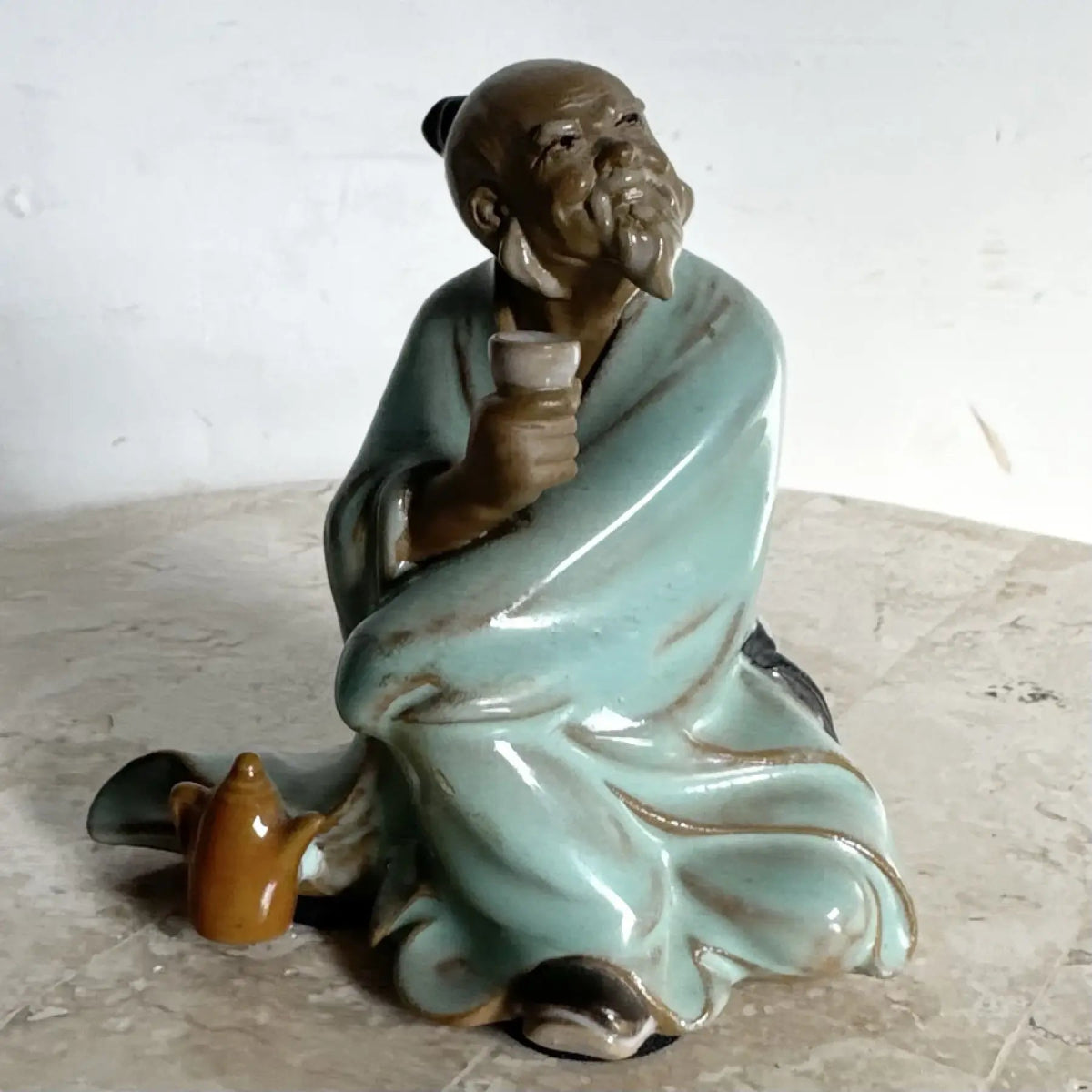 Vintage Chinese Pottery Figurine/Sculpture of a Mudman Drinking Tea - Dolphin & Flamingo