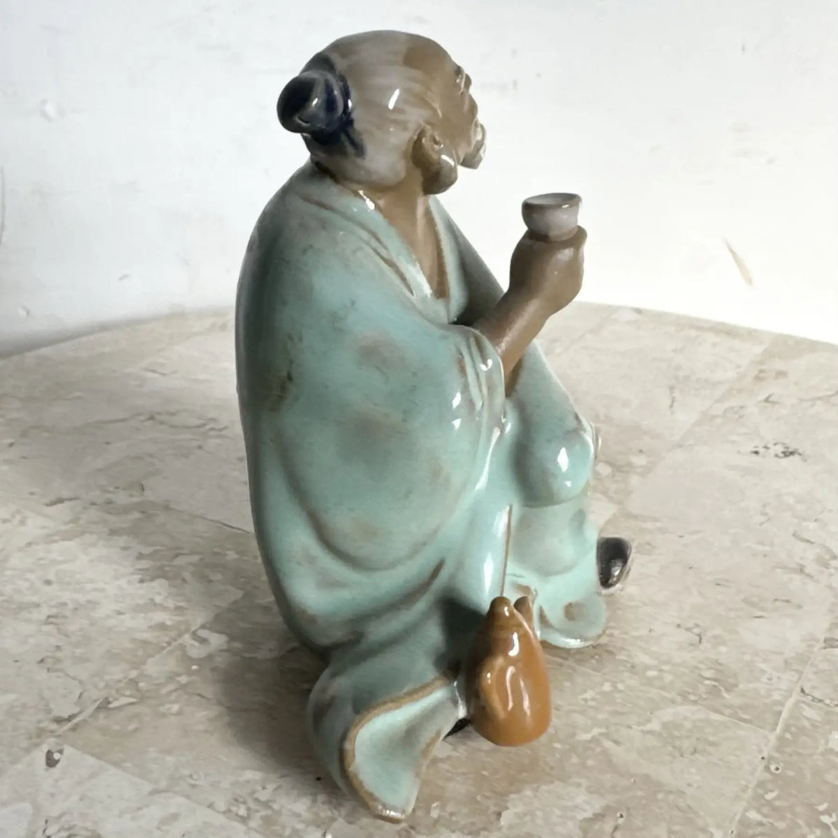 Vintage Chinese Pottery Figurine/Sculpture of a Mudman Drinking Tea - Dolphin & Flamingo