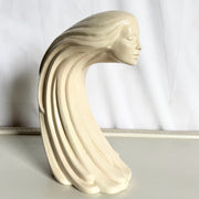 “Woman of the Wind" or "Moderne Frauenbüste Mit Langem Haar Aus Steinguss” From Ceramic - Dolphin & Flamingo