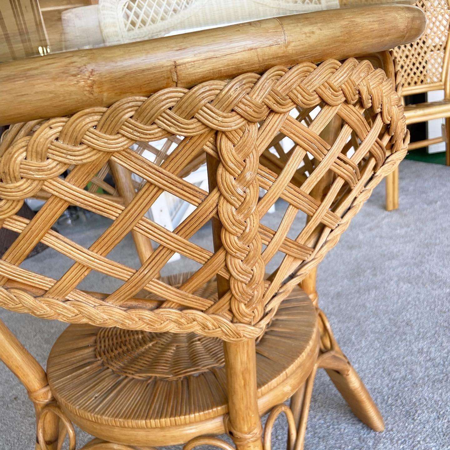 https://dolphinflamingo.com/wp-content/uploads/2022/11/1980s-boho-chic-rattan-and-woven-wicker-circular-glass-top-dining-table-8213.jpeg
